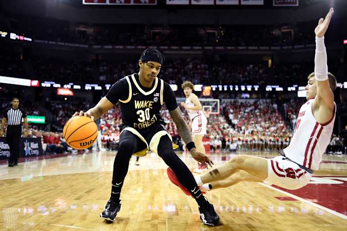 #30 Damai Monsanto creates space before knocking down a midrange jumper in the first half. #10 Isaac Lindsey was issued a flop technical